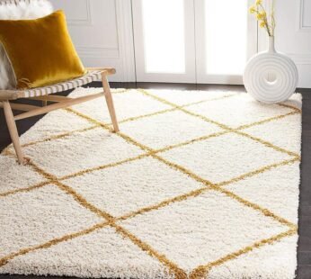 Elegance and Comfort: White Shaggy Carpet with Golden Strips