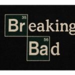 Breaking Bad inspired black tufted rug featuring bold cream typography and dark green graphic blocks