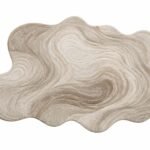 Ondelune hand tufted irregular rug in soft ivory cream with a flowing sculptural silhouette and rounded organic edges