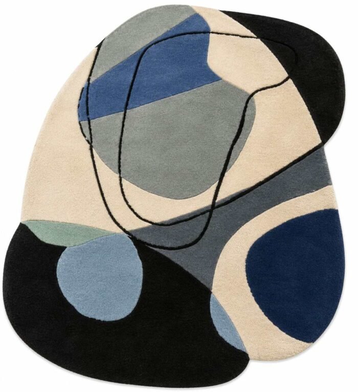 Nuvarell hand tufted irregular rug with abstract navy blue, slate blue, ivory, gray and black color blocks